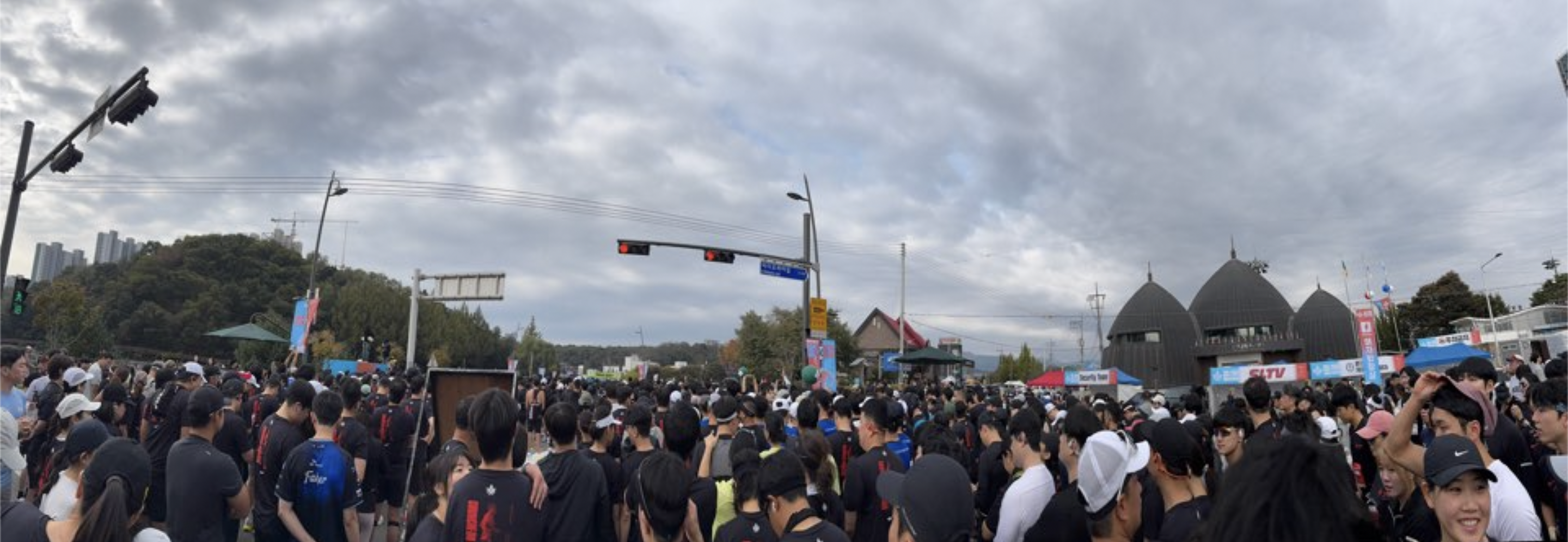 a massive crowd awaits before the start line